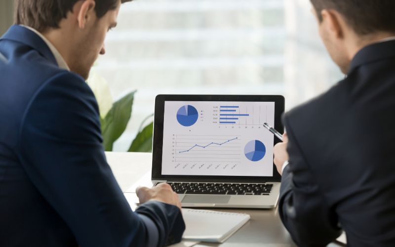 small-business-accountant-two-men-working-on-laptop-min