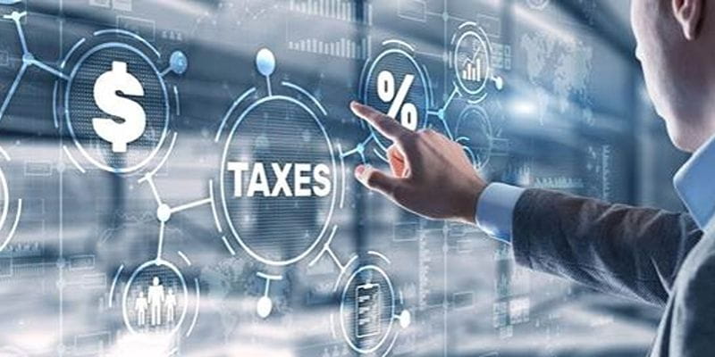 accounting-services-for-small-business-south-africa-man-pointing-taxes-digital-screen (1)